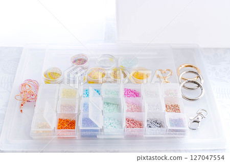 Colorful parts in a plastic case 127047554