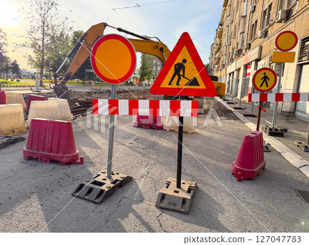 Under construction at sunset. Urban creativity and architectural detail. Under construction at sunset. Urban creativity and architectural detail. 127047783