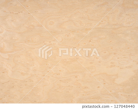 A seamless blend of alabaster and wheat, this bird's eye maple veneer whispers of understated luxury and natural grace 127048440