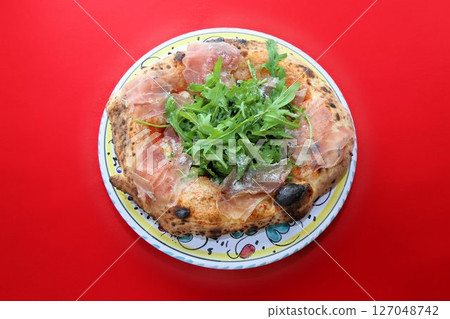 Delicious takeaway Italian food with chewy dough Authentic Neapolitan pizza Delicious takeaway Italian food with chewy dough Authentic Neapolitan pizza 127048742