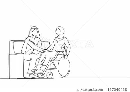 Single continuous line drawing Arab couple at home with disability woman in wheelchair holding hands with man sitting on sofa. Assistance rehabilitation of disabled person. One line draw design vector 127049438