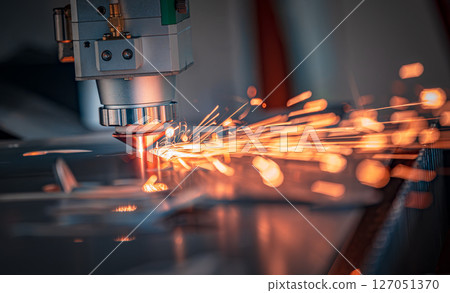 CNC Laser cutting of metal, modern industrial technology. CNC Laser cutting of metal, modern industrial technology. 127051370