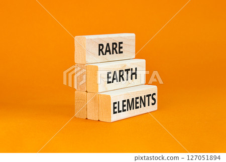 Rare earth elements symbol. Concept words Rare earth elements on beautiful wooden block. Beautiful orange table orange background. Business and rare earth elements concept. Copy space. Rare earth elements symbol. Concept words Rare earth elements on beautiful wooden block. Beautiful orange table orange background. Business and rare earth elements concept. Copy space. 127051894