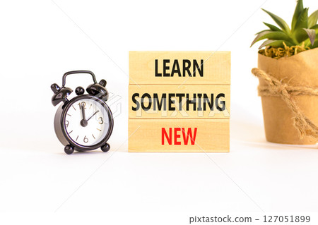 Learn something new symbol. Concept words Learn something new on beautiful block. Black alarm clock. Beautiful white background Business motivational lifestyle learn something new concept Copy space Learn something new symbol. Concept words Learn something new on beautiful block. Black alarm clock. Beautiful white background Business motivational lifestyle learn something new concept Copy space 127051899
