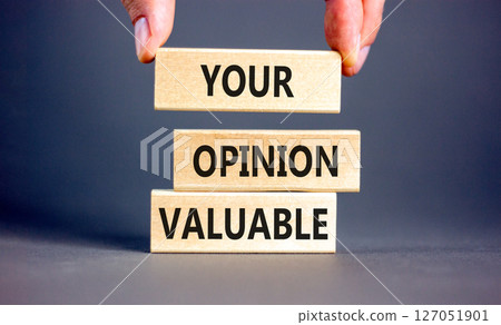 Your opinion valuable symbol. Concept words Your opinion valuable on beautiful wooden blocks. Beautiful grey background. Businessman hand. Business your opinion valuable concept. Copy space. Your opinion valuable symbol. Concept words Your opinion valuable on beautiful wooden blocks. Beautiful grey background. Businessman hand. Business your opinion valuable concept. Copy space. 127051901