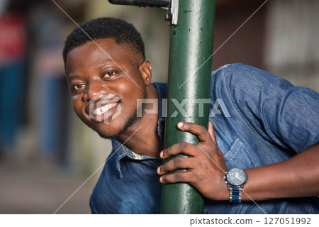 close-up of young african, smiling. close-up of young african, smiling. 127051992