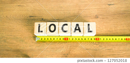 Local symbol. Concept word Local on beautiful wooden blocks. Beautiful wooden table wooden background. Beautiful yellow ruler. Business lifestyle local concept. Copy space. 127052018