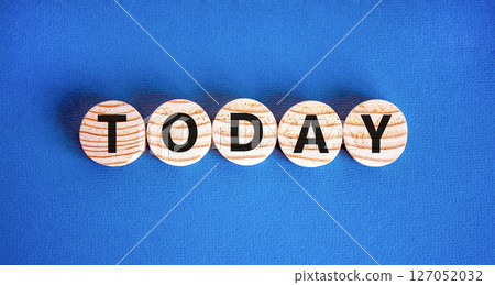Today symbol. Concept word Today on beautiful wooden circles. Beautiful blue table blue background. Business lifestyle today concept. Copy space. 127052032