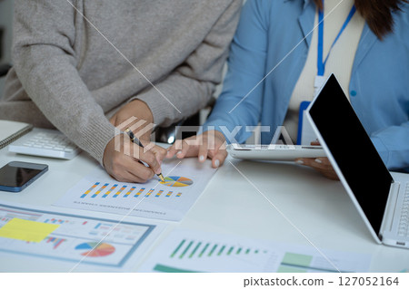 Project manager working and update tasks with milestones progress planning and professional investor working new start up project in the office 127052164