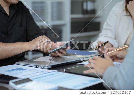Project manager working and update tasks with milestones progress planning and professional investor working new start up project in the office Project manager working and update tasks with milestones progress planning and professional investor working new start up project in the office 127052167