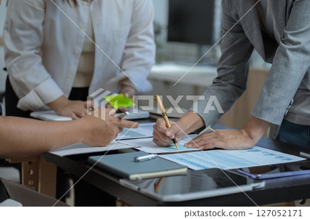 Business team present. professional investor working new start up project. tablet laptop computer with digital marketing media in design Finance managers meeting. 127052171