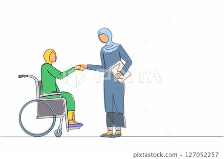 Single continuous line drawing disabled Arabian businesswoman in wheelchair shaking hand with business partner. Disability manager dialogue with business colleague. One line draw graphic design vector 127052257