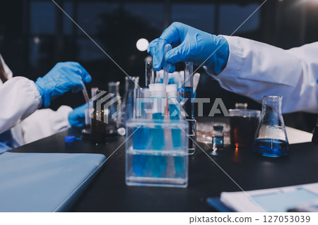 scientist working at the laboratory scientist working at the laboratory 127053039