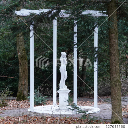 Kyiv, Ukraine January 27, 2025:  Sculpture of a naked girl on the territory of the Botanical Garden of the National University of Life and Environmental Sciences of Ukraine 127053368