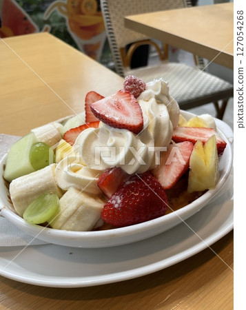 Dessert inside a cake 127054268