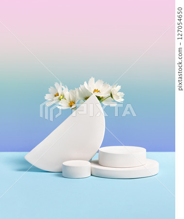 White round podium set on a gradient blue-purple background white cosmos flowers. Concept scene stage showcase for new product, sale, cosmetic, presentation. Abstract geometric composition in White round podium set on a gradient blue-purple background white cosmos flowers. Concept scene stage showcase for new product, sale, cosmetic, presentation. Abstract geometric composition in 127054650