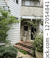 House with a lot of greenery 127054841