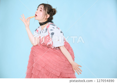 A young woman dressed in pop fashion A young woman dressed in pop fashion 127054890