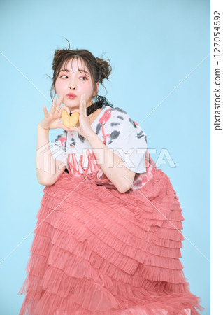 A young woman dressed in pop fashion A young woman dressed in pop fashion 127054892