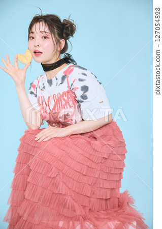 A young woman dressed in pop fashion A young woman dressed in pop fashion 127054898