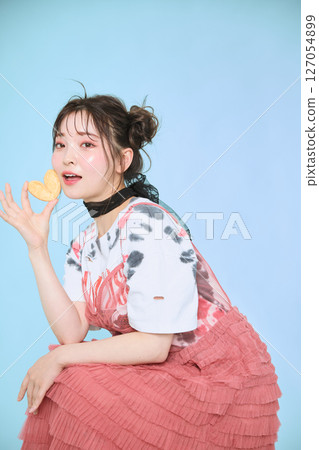 A young woman dressed in pop fashion A young woman dressed in pop fashion 127054899