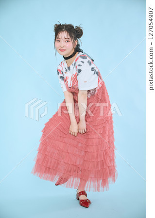 A young woman dressed in pop fashion A young woman dressed in pop fashion 127054907
