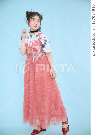 A young woman dressed in pop fashion A young woman dressed in pop fashion 127054910