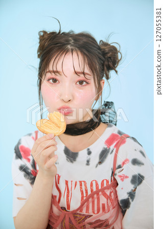 A young woman dressed in pop fashion A young woman dressed in pop fashion 127055381