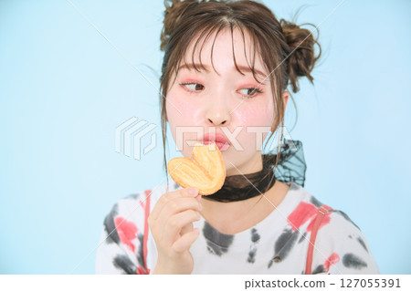 A young woman dressed in pop fashion A young woman dressed in pop fashion 127055391