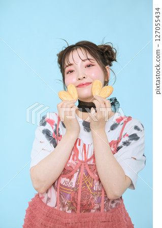 A young woman dressed in pop fashion A young woman dressed in pop fashion 127055434