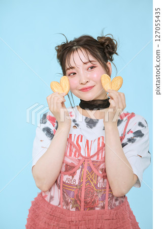 A young woman dressed in pop fashion A young woman dressed in pop fashion 127055435