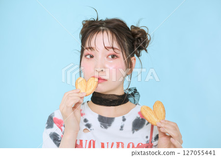 A young woman dressed in pop fashion A young woman dressed in pop fashion 127055441