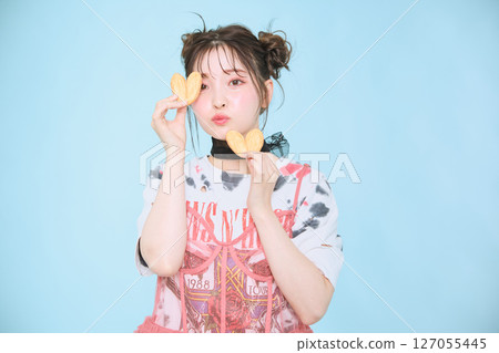 A young woman dressed in pop fashion A young woman dressed in pop fashion 127055445