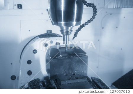 The CNC milling machine finish cut the mold parts by solid ball nose end mill tool in the light blue scene. The CNC milling machine finish cut the mold parts by solid ball nose end mill tool in the light blue scene. 127057010