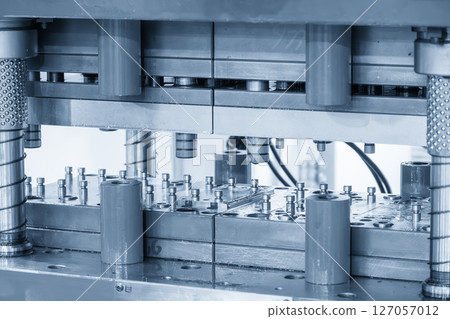 The electrical parts mass production by progressive die in the light blue scene. The electrical parts mass production by progressive die in the light blue scene. 127057012