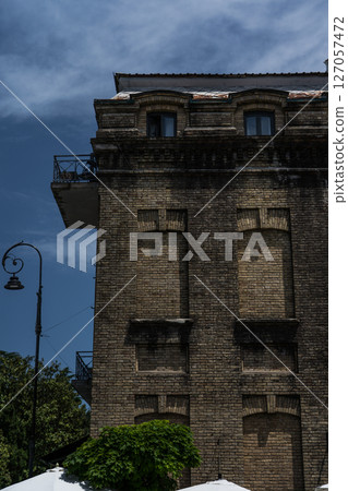 The facade of an old brick building in Batumi, Georgia 127057472