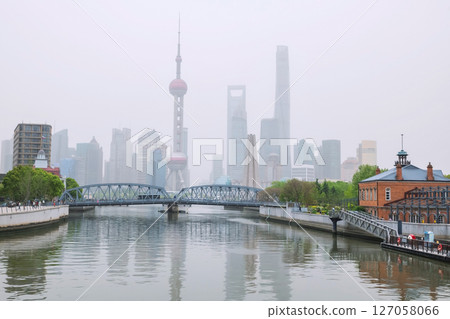 Waibaidu Bridge and Oriental Pearl tower with mist at the Bund, Shanghai 127058066