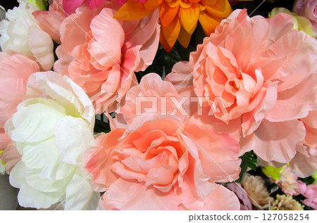 Colorful artificial flower bouquet 127058254