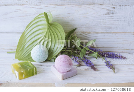 Spa still life with natural soap and fresh sage plant on wooden background.    127058618
