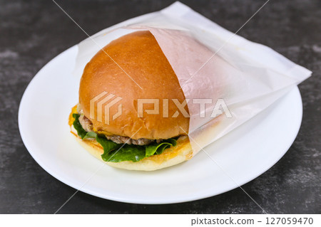 Homemade hamburgers on a plate 127059470