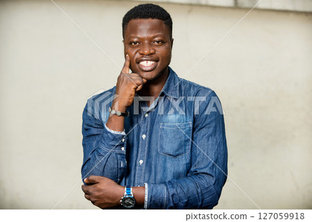 close up of young african man, happy. close up of young african man, happy. 127059918