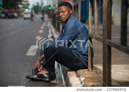 portrait of young african man. portrait of young african man. 127060458