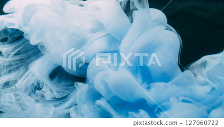 Haze wave. Ink steam. White blue liquid swirl spreading on black background. Blur color abstract contrast pigment underwater floating. Haze wave. Ink steam. White blue liquid swirl spreading on black background. Blur color abstract contrast pigment underwater floating. 127060722