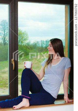 Young girl in morning. 127060782