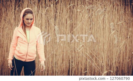 woman runner resting after workout run woman runner resting after workout run 127060790