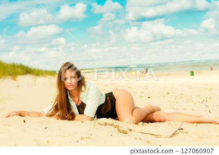 Long haired girl on beach, summertime 127060907