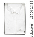 Classic white shirt with cuffs for cufflinks in the box on a white background 127061383