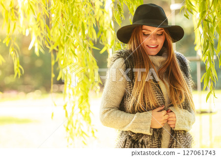 Attractive girl warm herself Attractive girl warm herself 127061743
