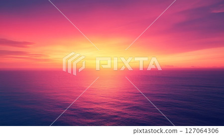 Pink and Orange Sunset Over a Calm Ocean Pink and Orange Sunset Over a Calm Ocean 127064306