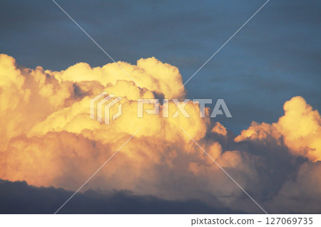 Cumulonimbus clouds illuminated by the setting sun in Sao Paulo, Brazil 127069735